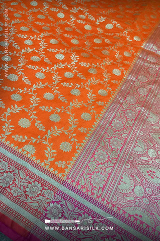 Orange And Pink Banarasi Silk Saree designed for wedding and bollywood gala events.