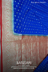red and blue georgette saree with intricate patterns and tassels, featuring the brand 'Bansari'.
