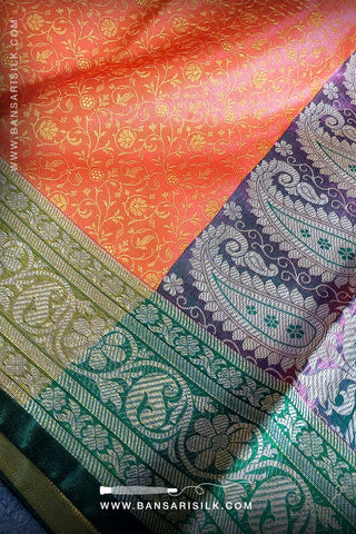 It is a yellow and red Banarasi Silk Saree woven in Tanchoi design, best for haldi and Indian weddings by bansarisilk.com